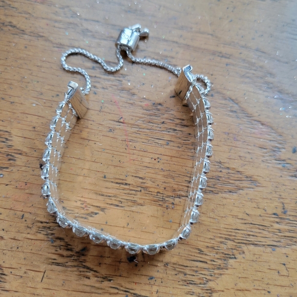 NWT TOUCHSTONE BY SWAROVSKI ADJUSTABLE SILVER BRACELET..IN BOX NEVER WORN. - Picture 3 of 5